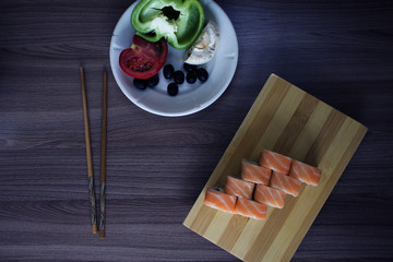 sushi rolls and vegetables