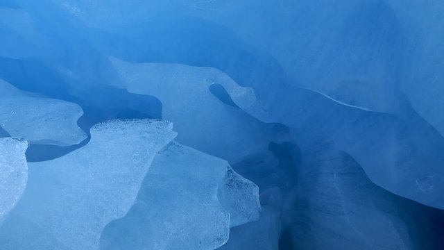 Inside blue glacier. Ice cave in Norway