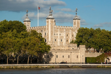 Fototapeta na wymiar Tower of London, by river Thames on a sunny day