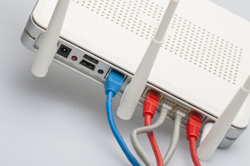Network cables connected to the router. Network Communications