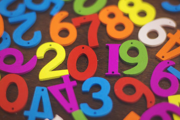 colorful wooden numbers forming the number 2019, For the new year 2019