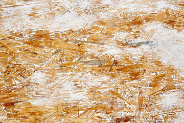 White painted oriented strand board OSB, wooden background