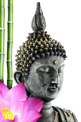 Buddha face with lotus flower and bamboo stem