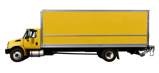 Isolated yellow freight truck and cab.