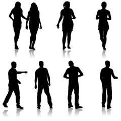 Black silhouette group of people standing in various poses