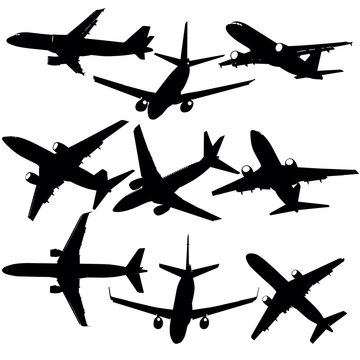 Set of silhouettes of planes from different eras on a white background