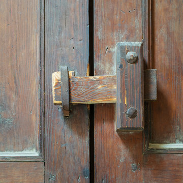 Closeup of a wooden aged latch over an ornate wooden door, Cairo, Egypt
