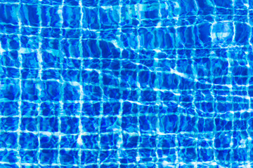 Water surface in turquoise swimming pool - holiday tropical back