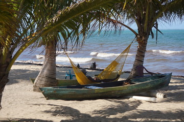 Fototapeta na wymiar Lazy afternoo in a hammock an the caribean village of Hopkins, Belize