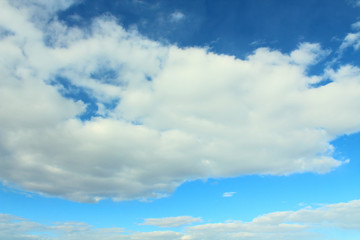 Beautiful natural blue sky and white fluffy clouds. Background. Landscape.