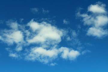 Fototapeta premium Beautiful natural blue sky and white fluffy clouds. Background. Landscape.