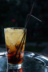summer fresh cocktail with ice, fruit and vegetables
