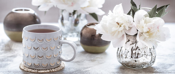 Fototapeta na wymiar still life with interior details and a cup of tea