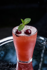 summer fresh cocktail with ice, fruit and vegetables