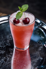 summer fresh cocktail with ice, fruit and vegetables