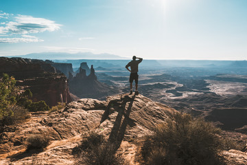 young man with Magnificent view of Canyonlands, Utah, USA.