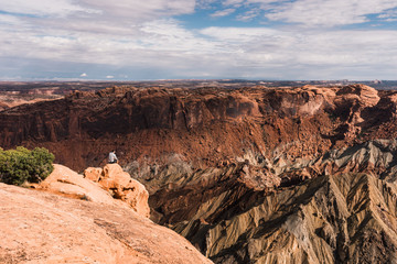 young man with Magnificent view of canyon, Arizona, USA.