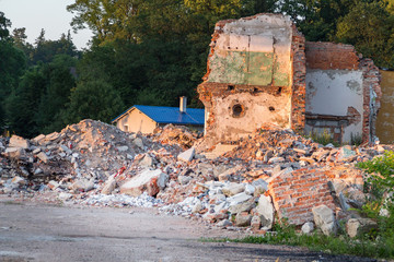 Destroyed brick building in Poland, dismantling of houses