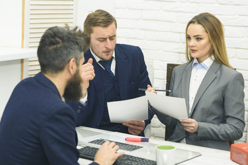Business negotiations, discuss conditions of deal. Man with beard drinks tea while waiting for bosses decision. Business partners or businessman at meeting, office background. Negotiations concept