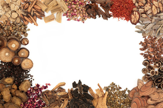 Chinese Herbal Medicine With Traditional Herbs Forming A Background Border On White Background.