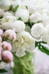 Lovely flowers in glass vase. Beautiful bouquet of white peonies . Floral composition, scene, daylight. Wallpaper