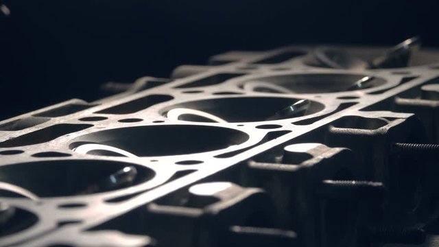 close up refocusing shot of disassembled car's engine with valves. 4k shot
