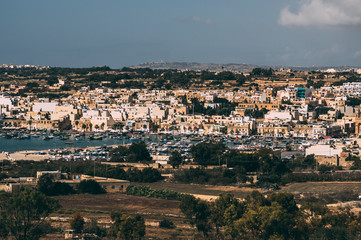 Fototapeta na wymiar View to cityscape of Marsaxlokk, Malta