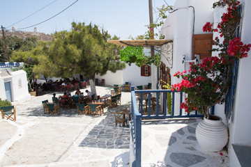 Amorgos,Greece-August 4 ,2017.Small taverns and bars along the narrow white streets in the Chora of Amorgos