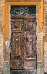 Fototapeta na wymiar Maltese old brown door, Malta