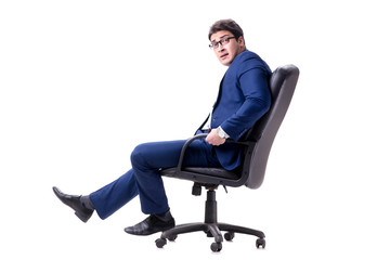 Businessman sitting on office chair isolated on white