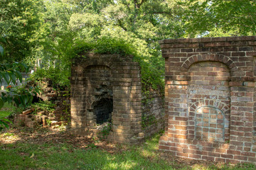 Old unmarked graves brick stone caved in