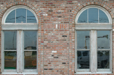 old windows brick wall