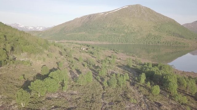Mountain lake in Norway. Aerial footage in D-LOG profil
