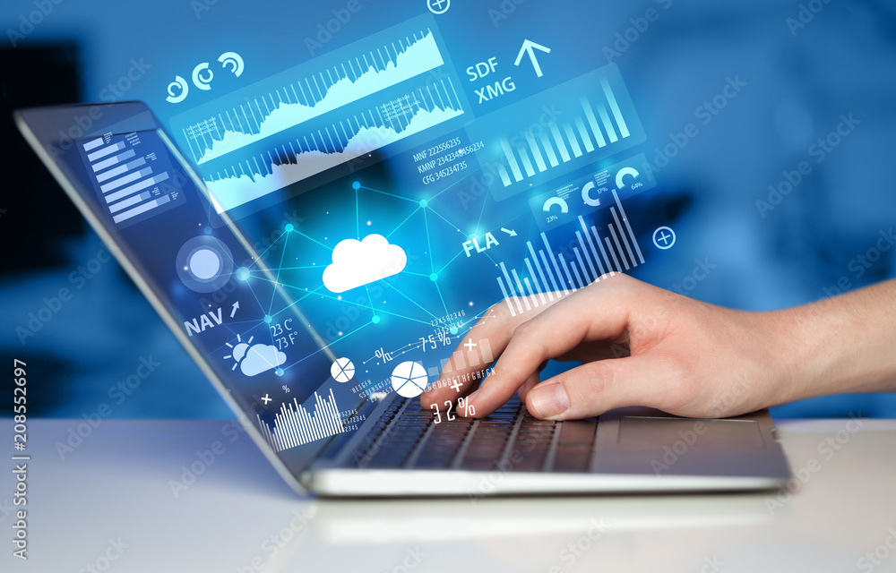 Aufkleber hand using laptop with cloud technology and linked information concept