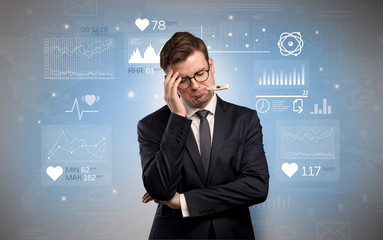 Young sick businessman with fever and medical research concept
