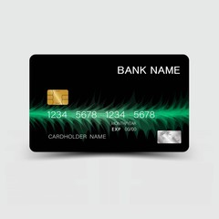 Modern credit card template design. With inspiration from the abstract. Green and black color on the gray background. Vector illustration. Glossy plastic style.