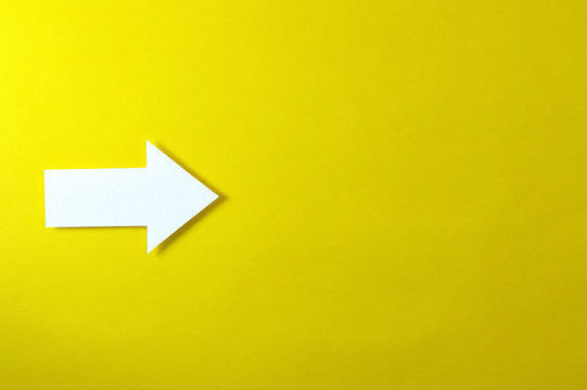 one solid arrow on yellow background