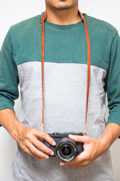 Hipster men with leather camera strap on white background