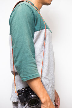 Hipster men with leather camera strap on white background