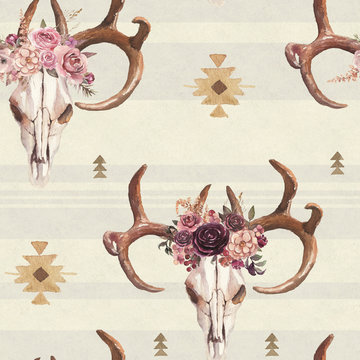 Watercolor boho seamless pattern of deer skull with antlers & floral arrangement on bright background