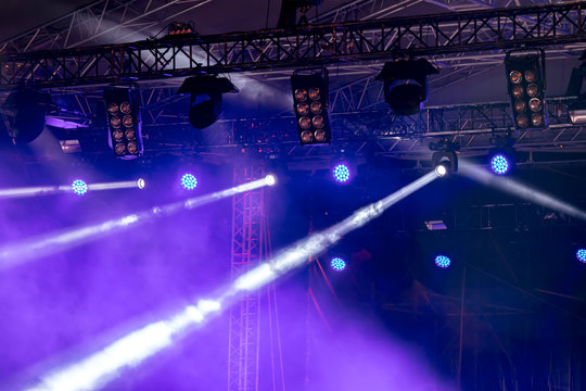 stage rig with lightning equipment. blue stage lights during the performance