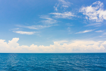 Fototapeta na wymiar Idyllic perfect blue sky seascape with cloud
