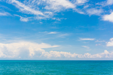Fototapeta na wymiar Idyllic perfect blue sky seascape with cloud