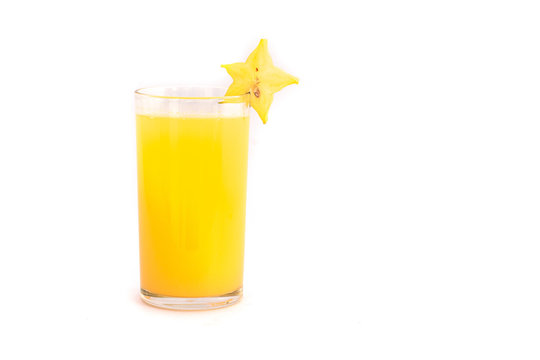 Pineapple juice in glass on white isolation