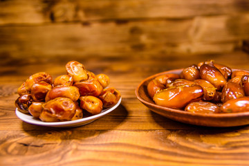 Date fruits on the rustic wooden table