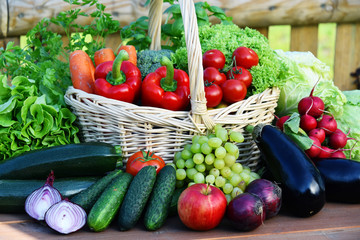 Variety of fresh organic vegetables in wicker basket