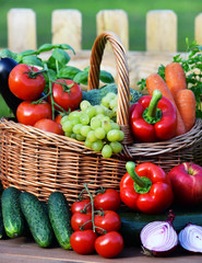 Variety of fresh organic vegetables in wicker basket