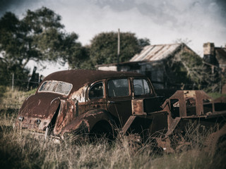 Old car in field