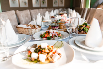 Different salads served at the celebratory table.
