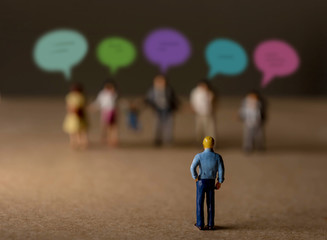 Customer Experience Concept. present by Miniature Figure of Businessman Listening Feedback from...